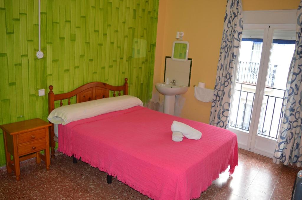 Habitación doble con balcón del Hostal Doña Carmen